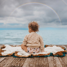 Load image into Gallery viewer, Toddler in a Lighthouse Kids Company Supreme pocket nappy - Moon Rainbow - Peanut and Poppet UK
