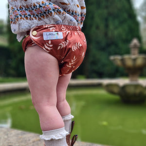 Child wearing Little Poppet Pull-Up and Pocket in Cassia - Peanut and Poppet UK