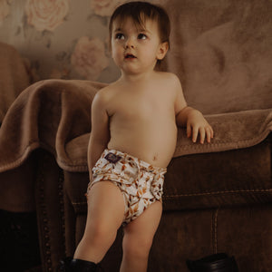 Toddler wearing Little Lovebum Quickdry in Akiho - All-in-One Cloth Nappy - Peanut and Poppet UK